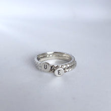 Initial Ring with a Twisted Band
